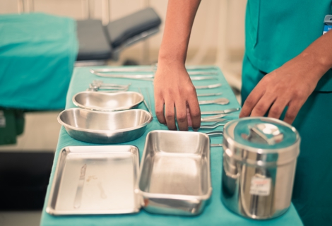 Medical students are preparing equipment to study surgery to treat sick people.